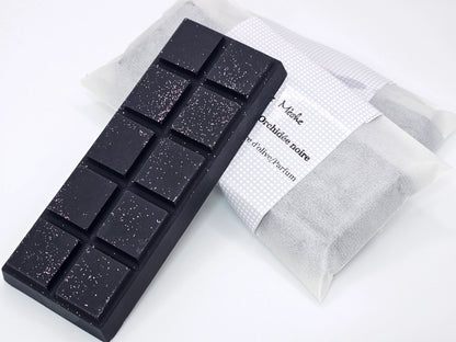 Fondant parfumé snapbar artisanal à l’orchidée noire, couleur noire avec paillettes